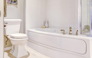 Bathroom with toilet and bathtub