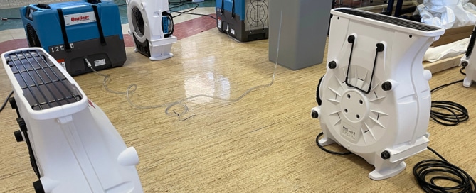 Water damage fans drying out a floor