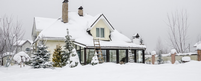 Exterior of a home covered in snow
